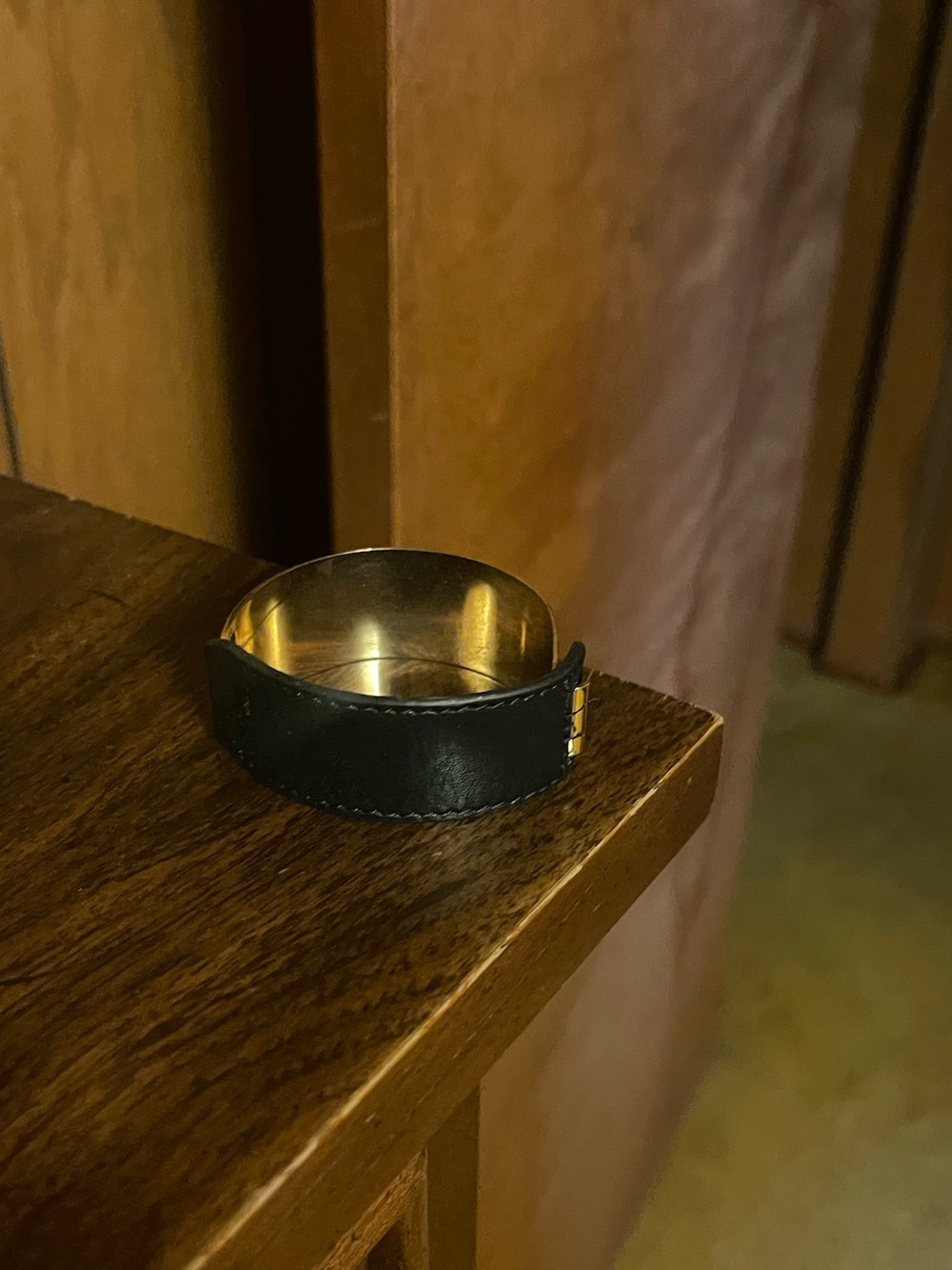 Gold-Tone Cuff Bracelet with Black Leather Trim